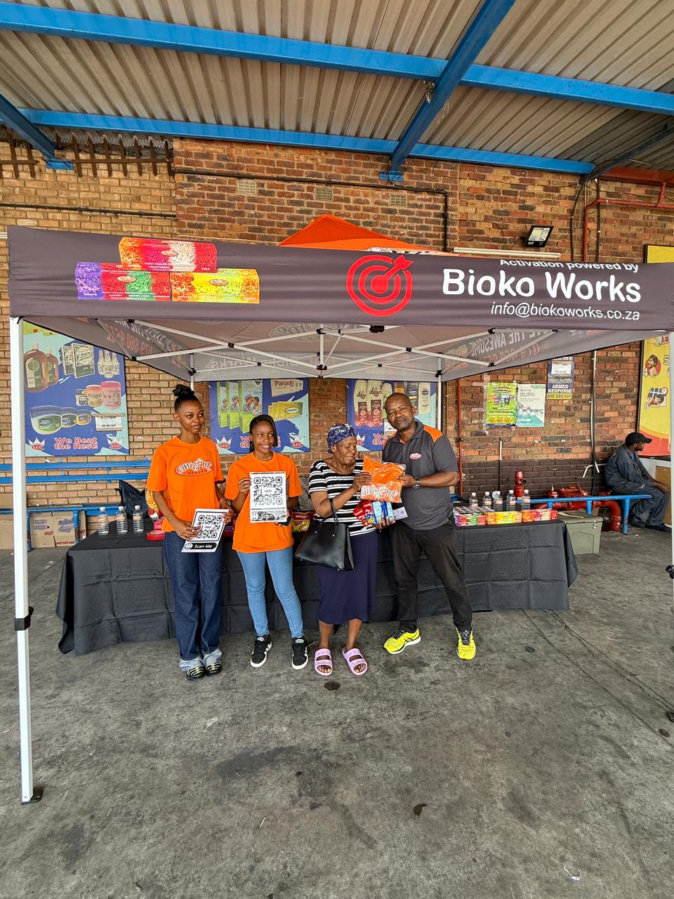 Awesome Snacks team and customer at the activation event