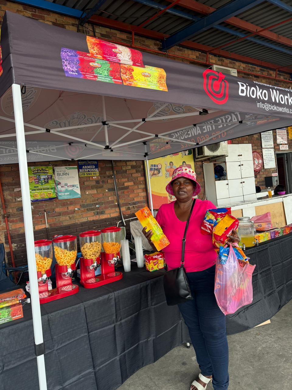 Activation team members standing at the Awesome Snacks event site